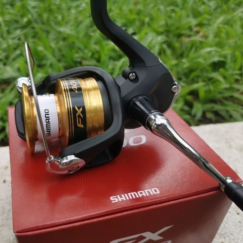 Máy câu cá shimano FX 2500FB,FX4000  (cam kết đổi trả trong 2 tuần đầu)