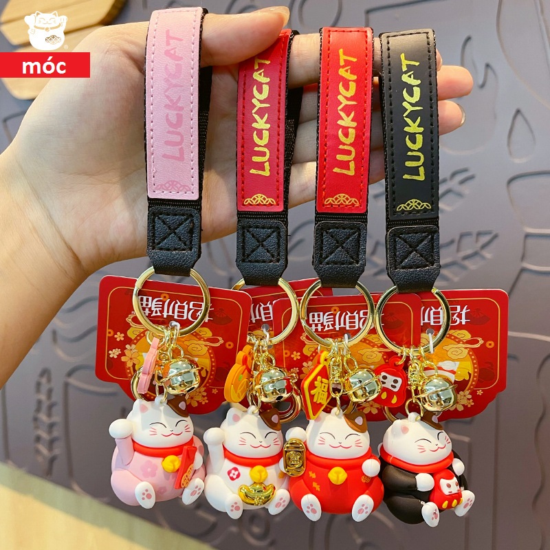 Móc khóa Mèo thần tài ôm vàng bạc