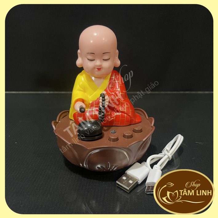 Tượng chú tiểu tụng kinh gõ mõ năng lượng mặt trời có nhạc