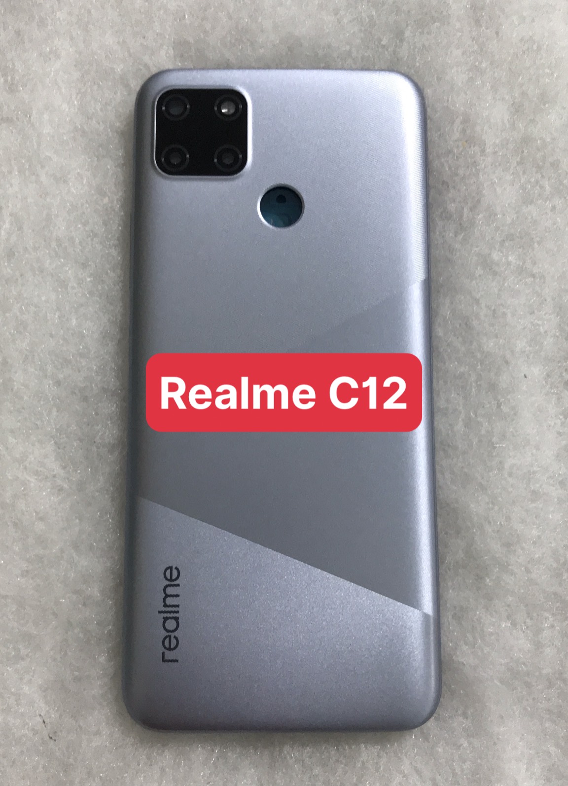 Bộ xương vỏ Realme C12 (bộ gồm lưng,sườn ,phím bấm,kính camera)