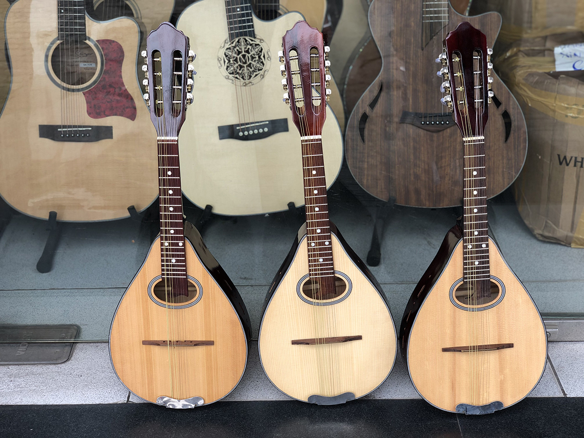 Đàn mandolin gỗ ép mặt thông