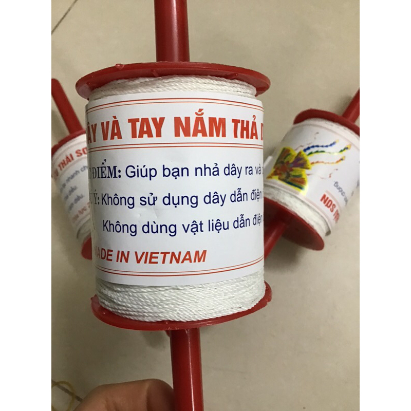 Cuộn 100 mét dây dù thả diều sẵn tay cầm
