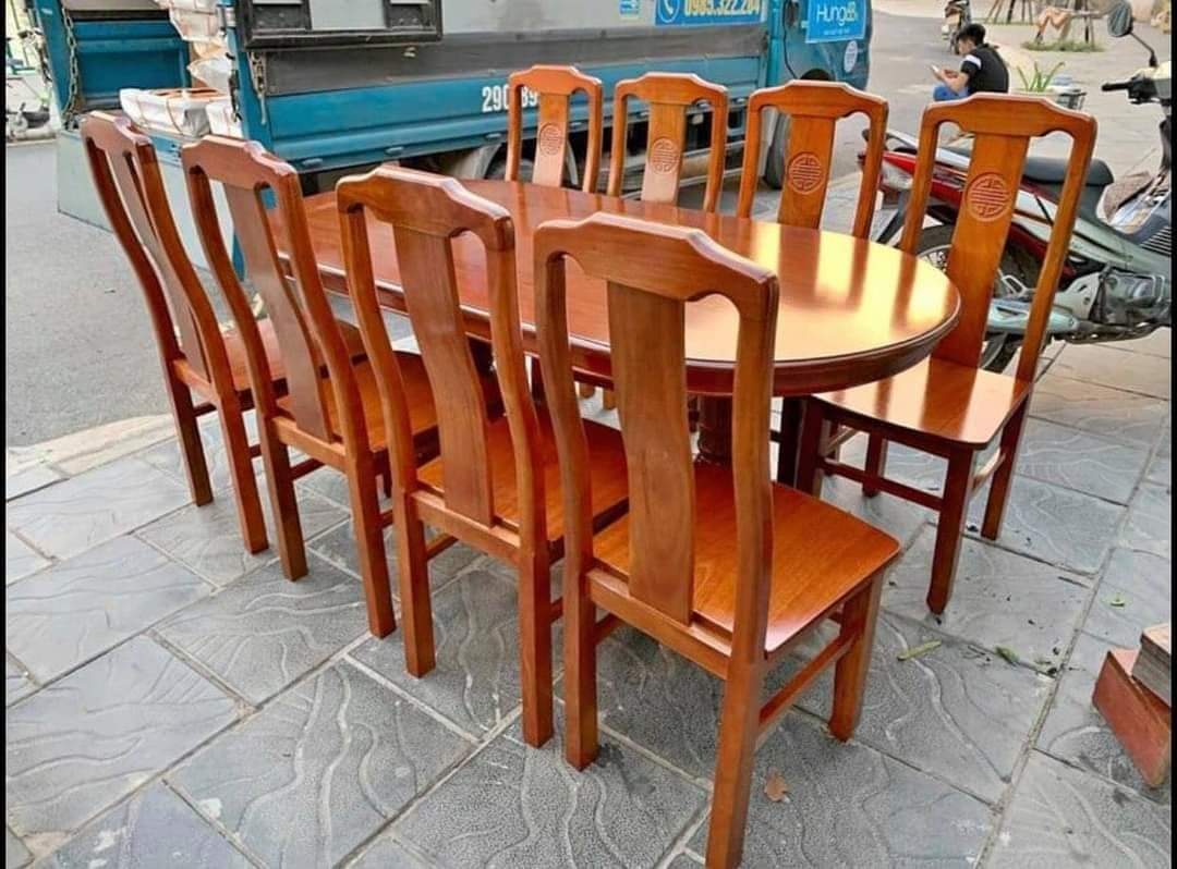 bàn ăn bầu dục 8 ghế gỗ trẹo