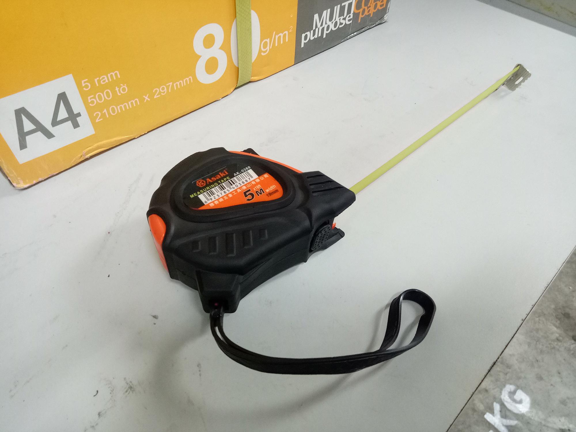 Thước cuộn lá thép Asaki AK-388 C2-5m (Đen phối cam)