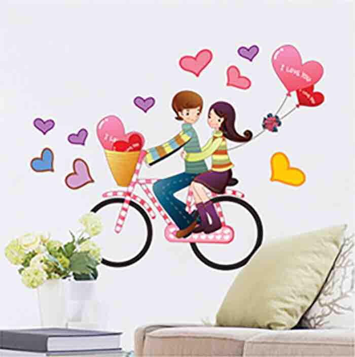 Decal tranh dán tường đôi bạn đạp xe