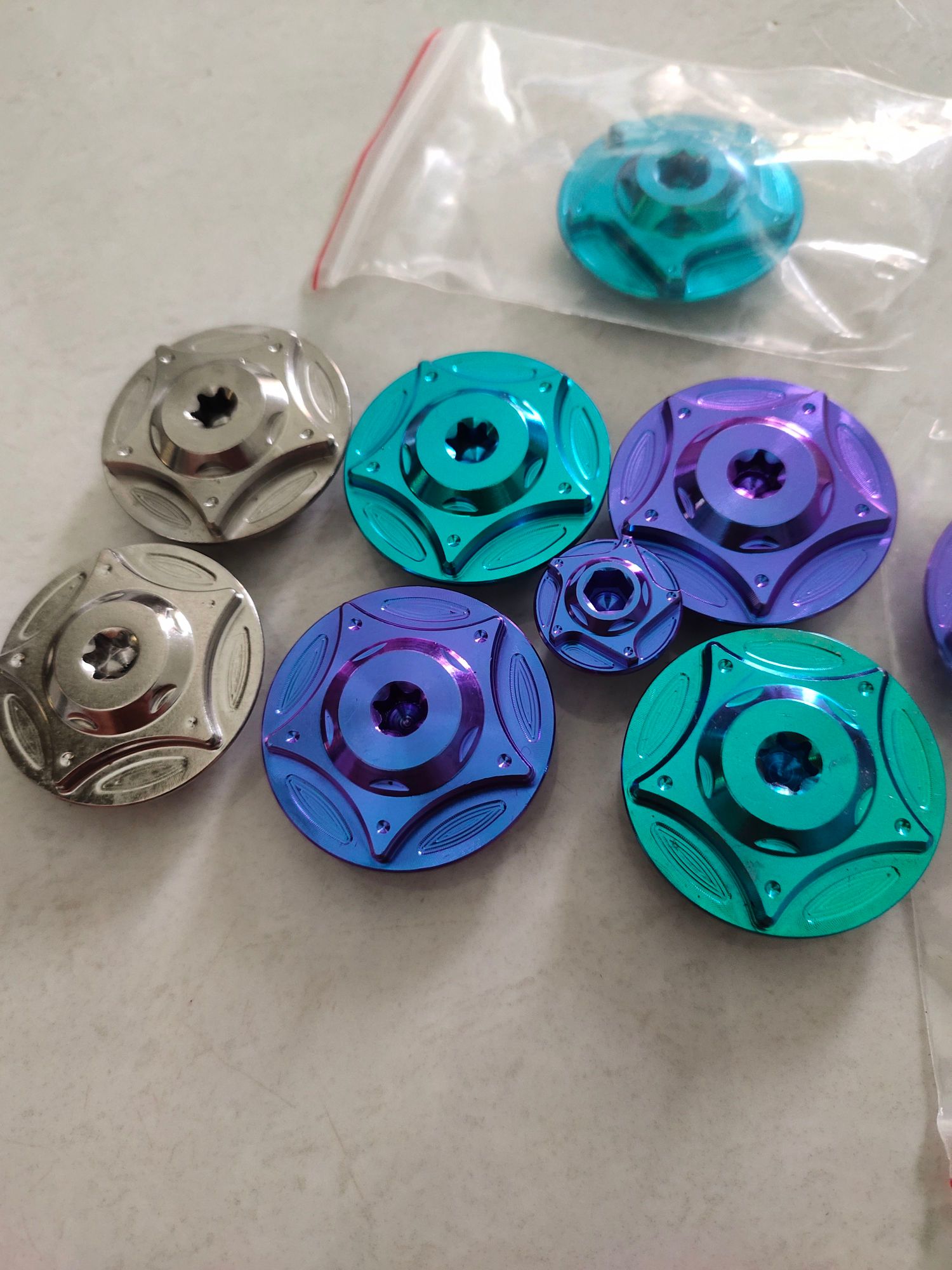 2 ôc mâm lủa raider satria xanh luc bảo