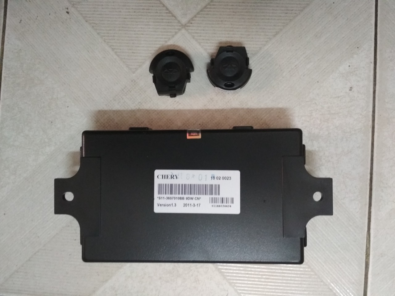 Hộp điều khiển và remote cửa Chery QQ