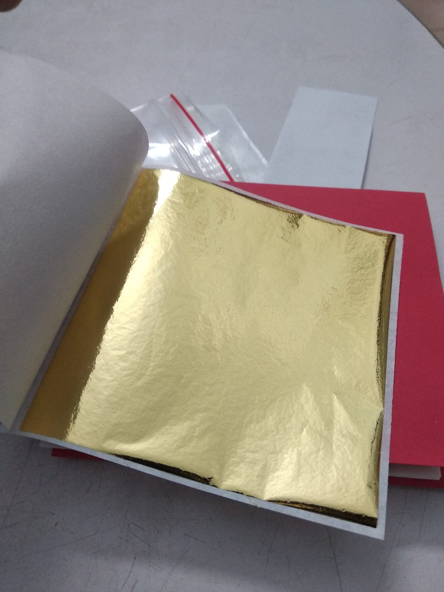 Vàng lá ăn được dùng để dát bò,trang trí 24k túi 10 lá