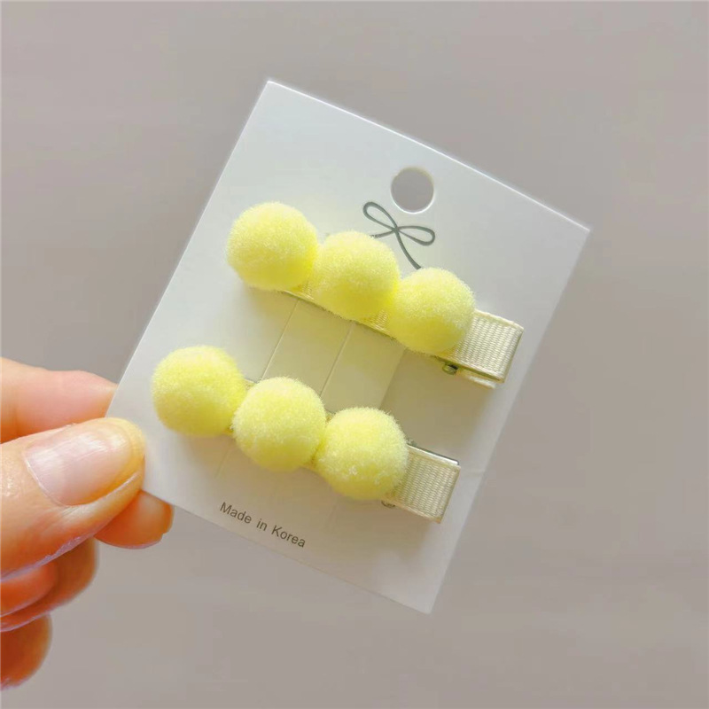 set 2 kẹp tóc pon pon cho bé .
