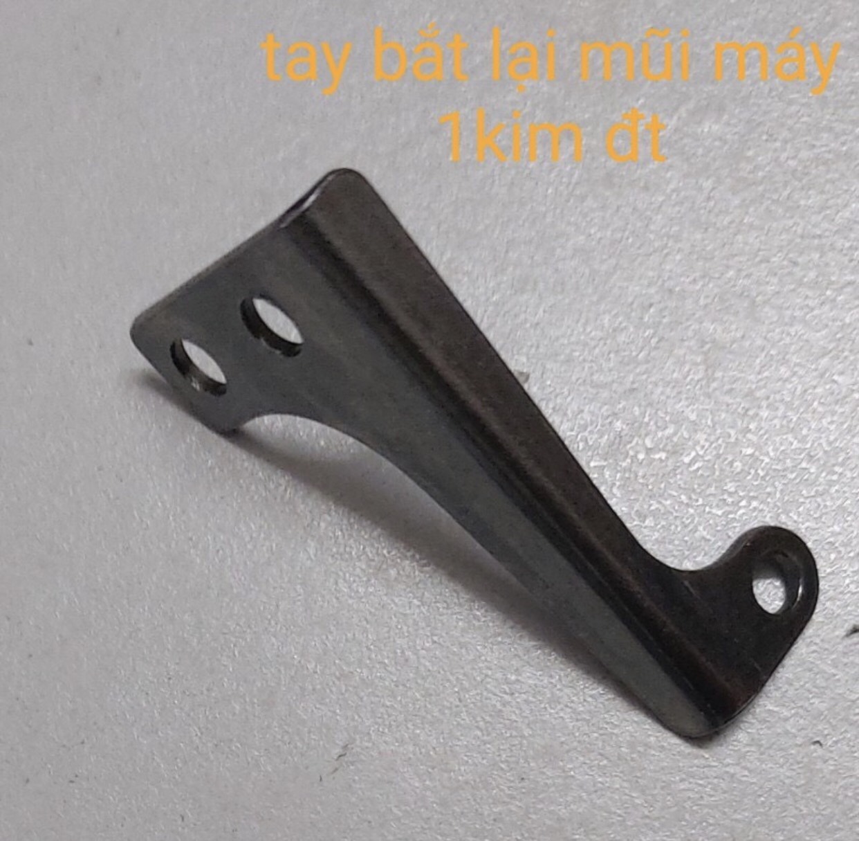 Tay bắt lại mũi máy 1 kim điện tử