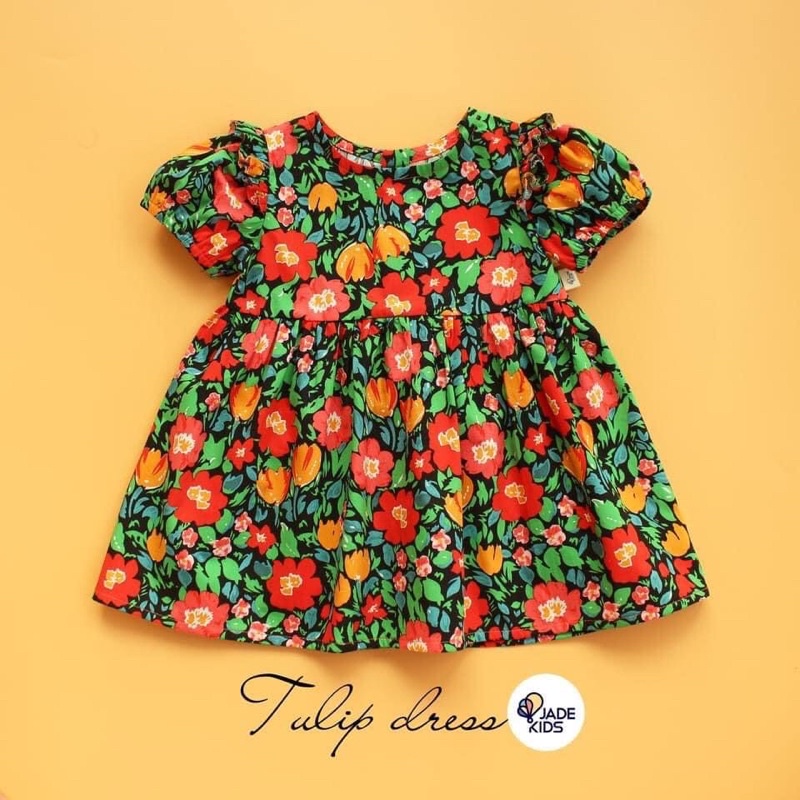 Vải thô cotton hoa tuylip cam siêu hot và mềm mát
