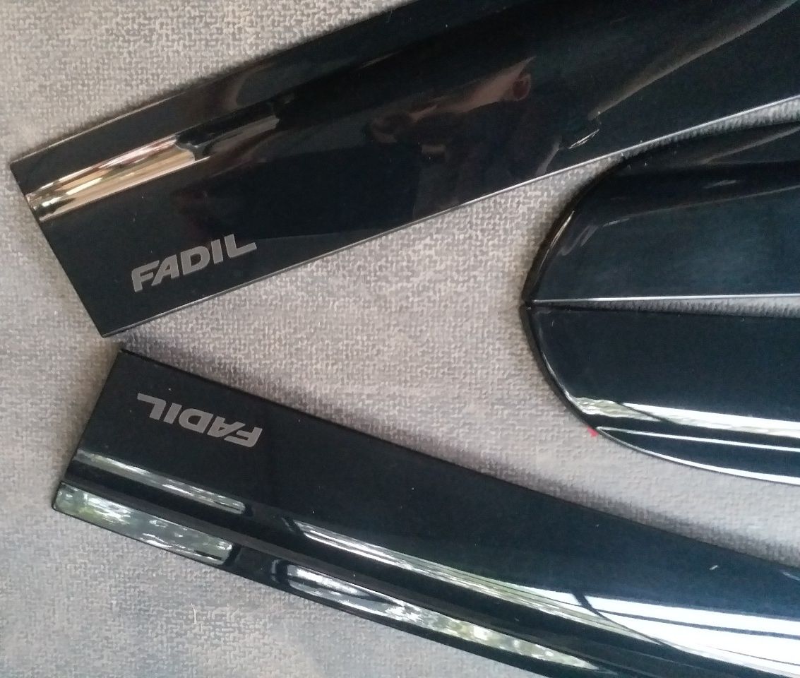 Bộ vè mưa đen xe Fadil