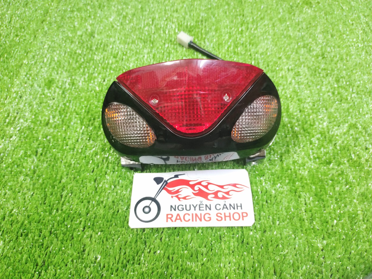 xi nhan pha đèn hậu satria 2000