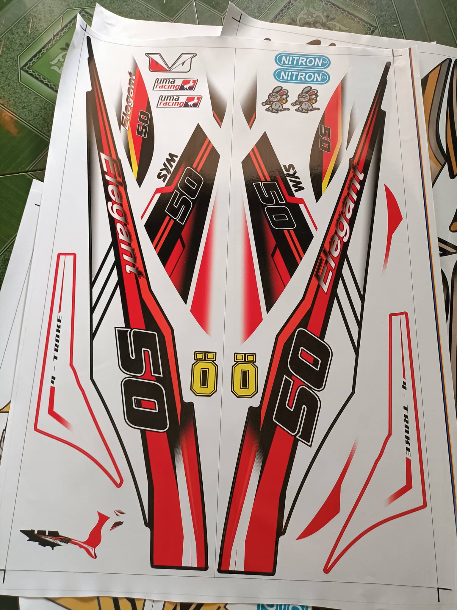 tem rời elegant 50cc đỏ trắng
