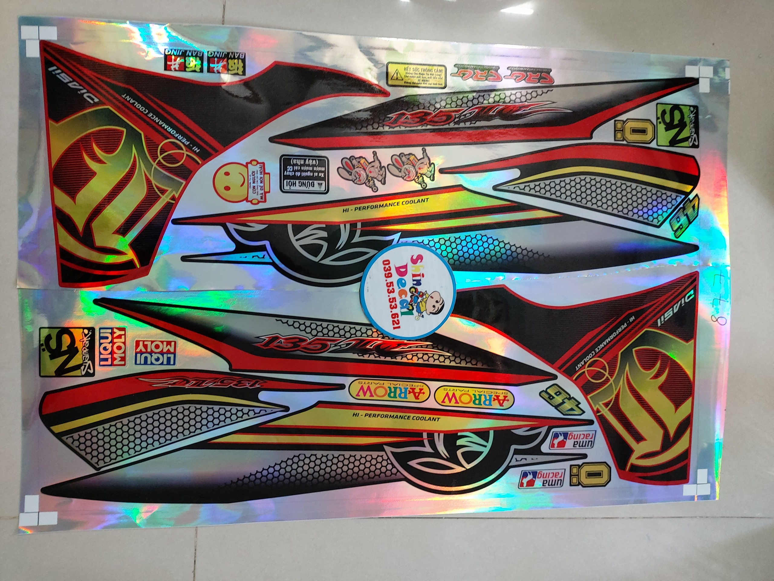 Tem exciter 135 lc đỏ đen tặng logo thỏ cầm phuộc