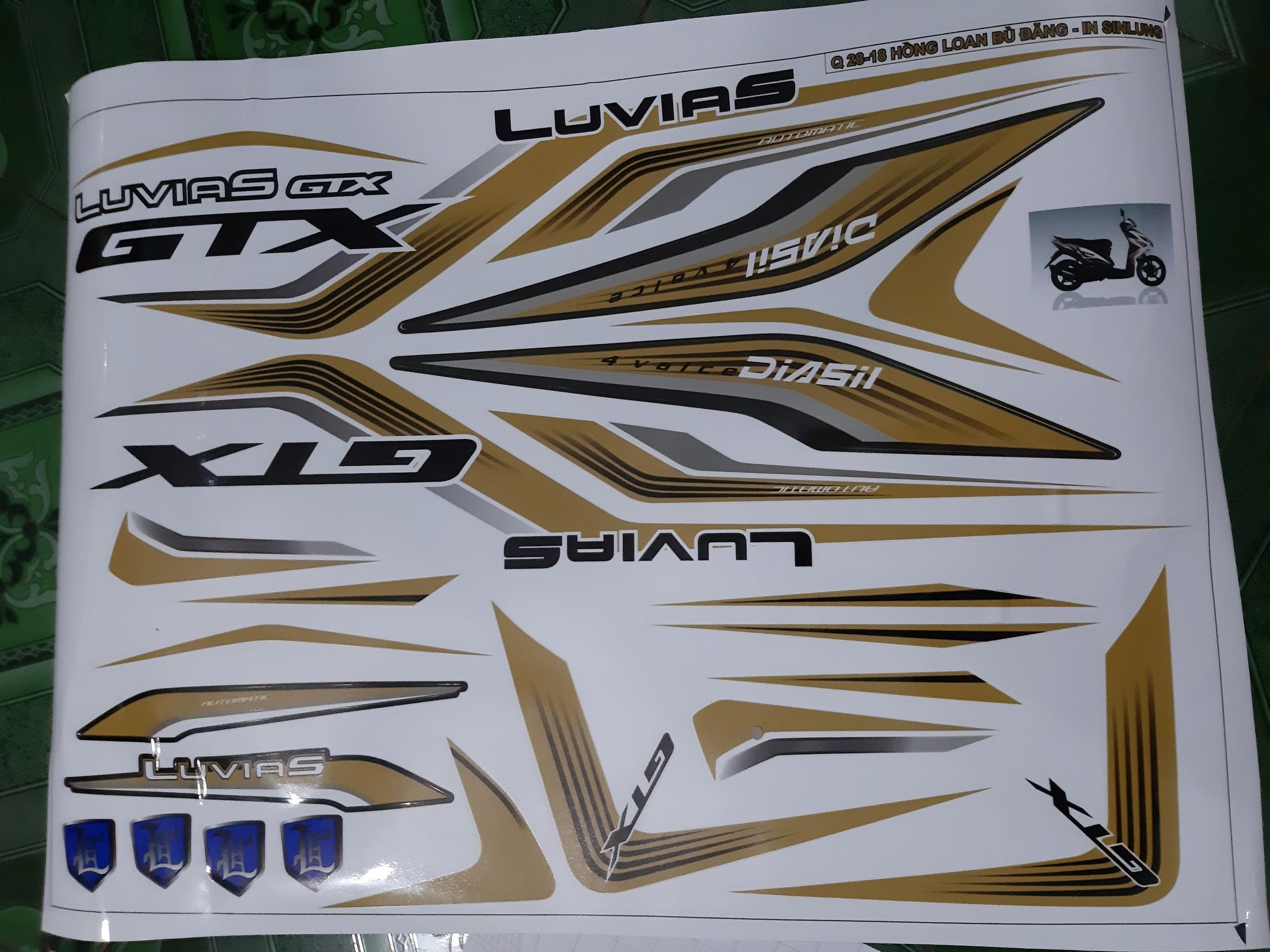 Tem rời  luvias gtx vàng đồng xe trắng