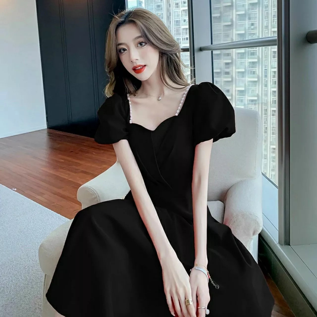 Đầm nữ tay phồng kết cườm vai xếp ly