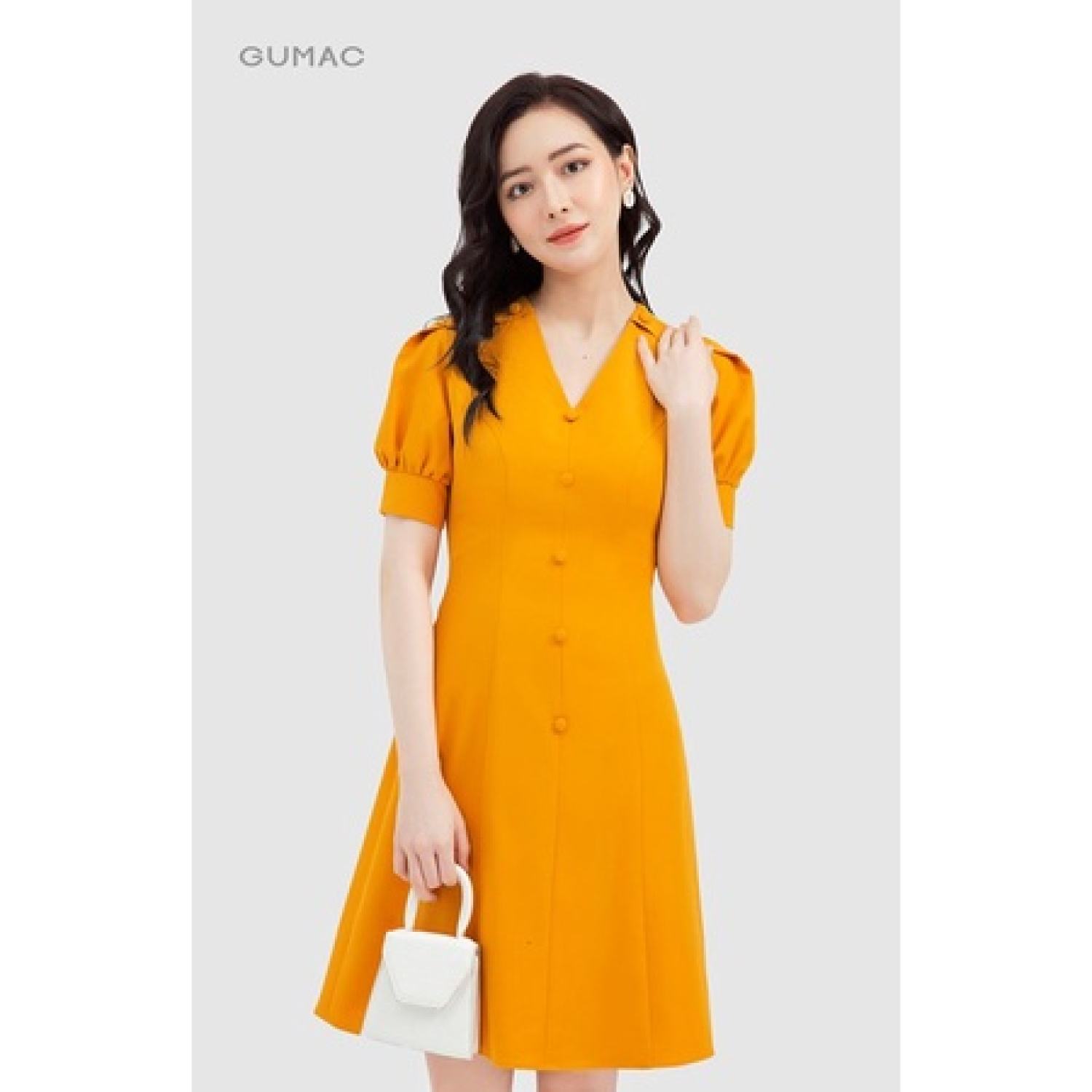 Đầm cổ V phối nút GUMAC
