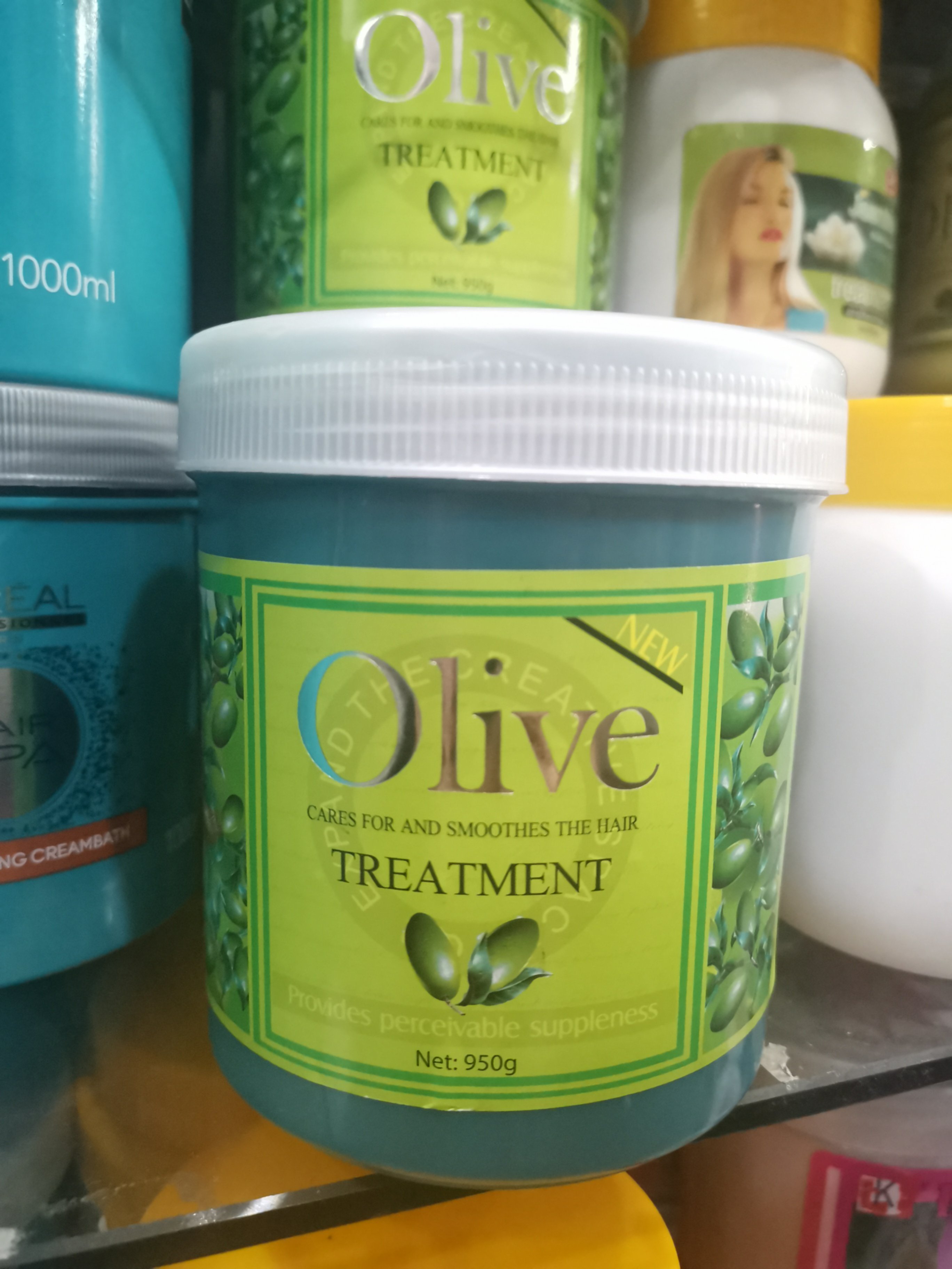 Dầu hấp tóc Olive Treatment 950ml