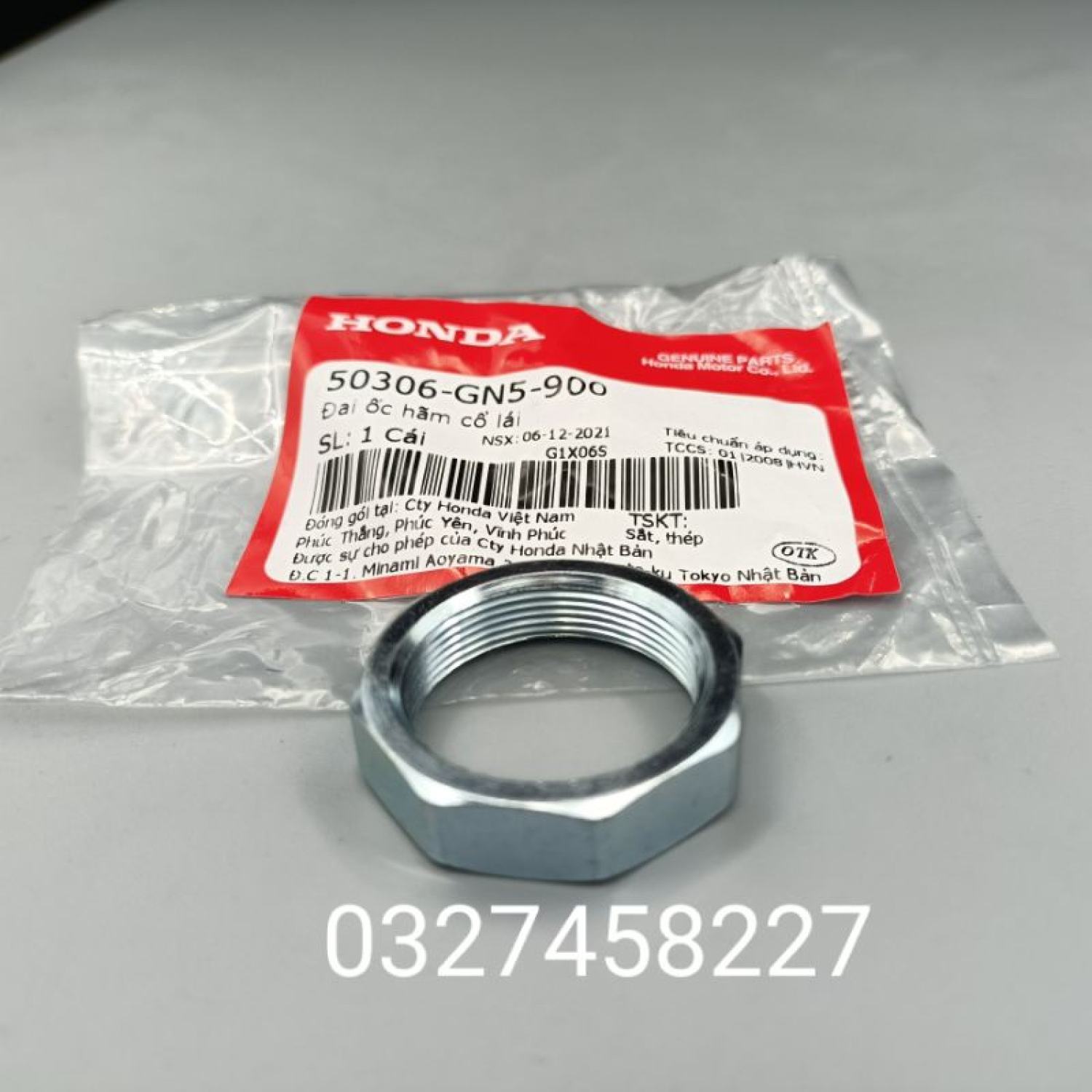 Đai ốc xiết, tán hãm cổ lái xe DREAM, WAVE, FUTURE... zin Honda