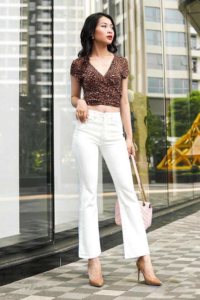 Quần jeans nữ ống loe dài màu trắng