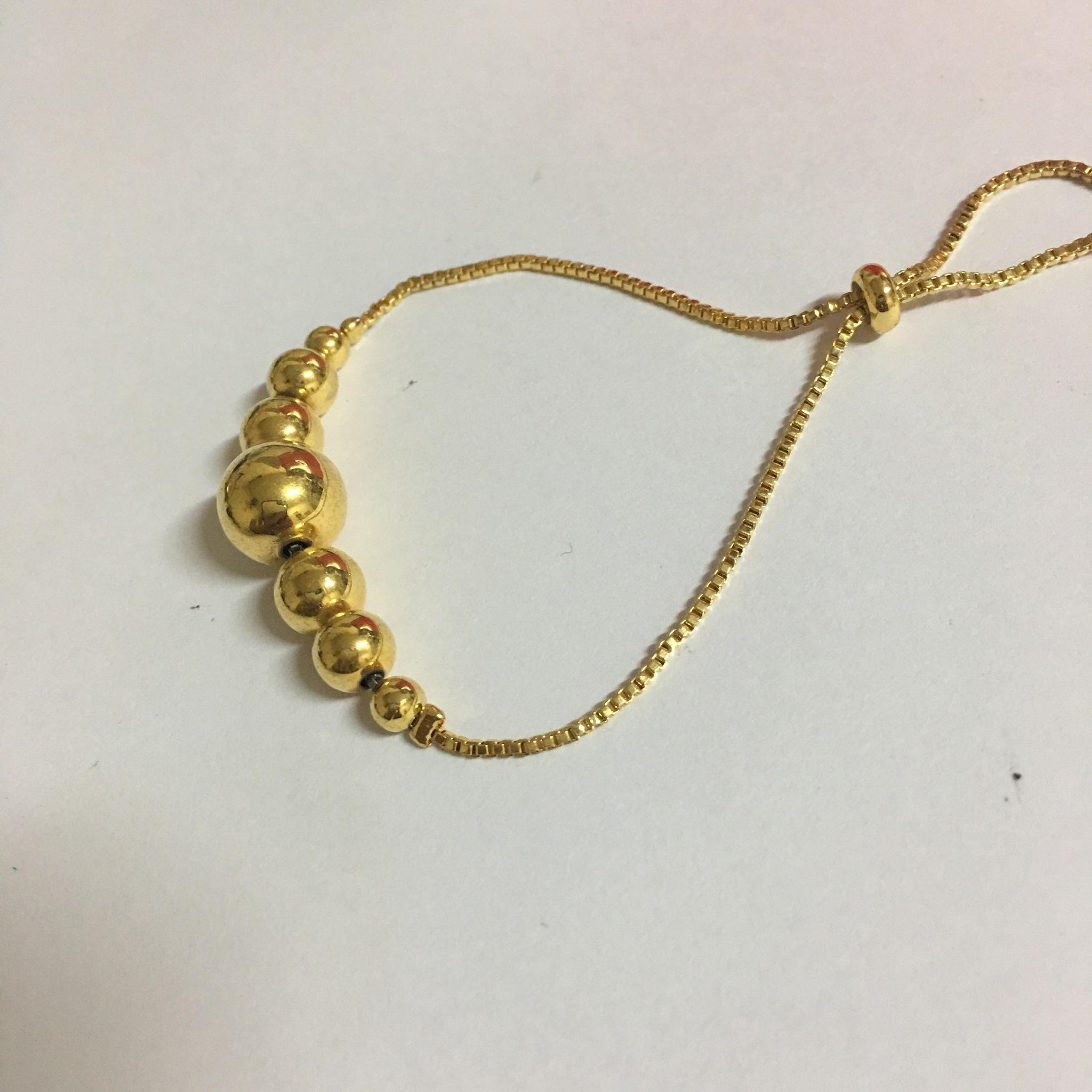 lắc tay kim tiền đồng xu