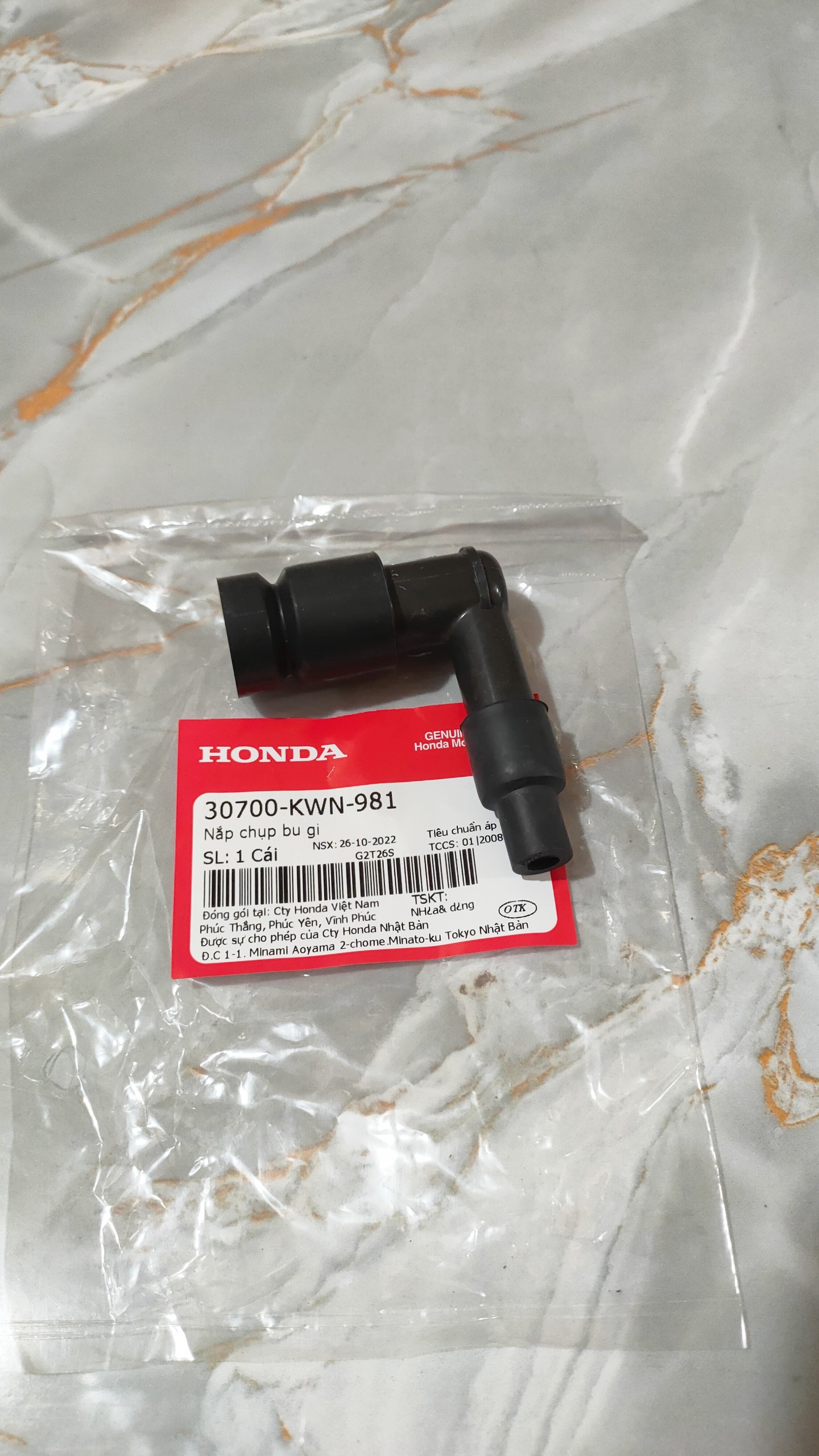 Nắp chụp bu gi pcx