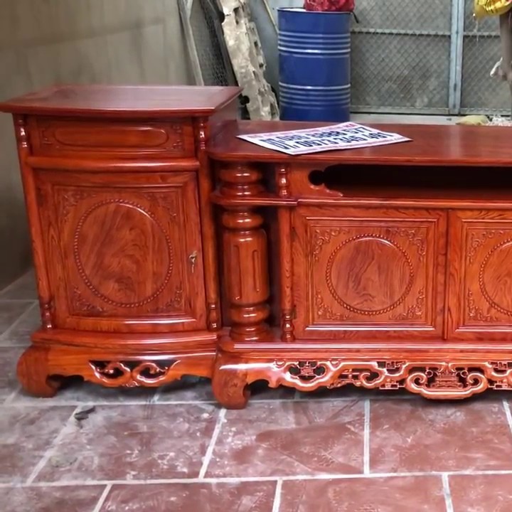 Kệ tivi cột nho gỗ gụ
