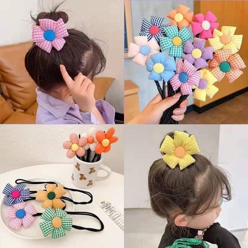 Thanh uốn, búi tóc hình hoa dễ thương cho bé