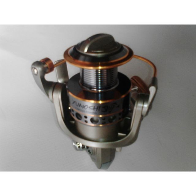 máy câu cá kim loại yumoshi lc7000  (cam kết bán hàng chất lượng có bảo hành)