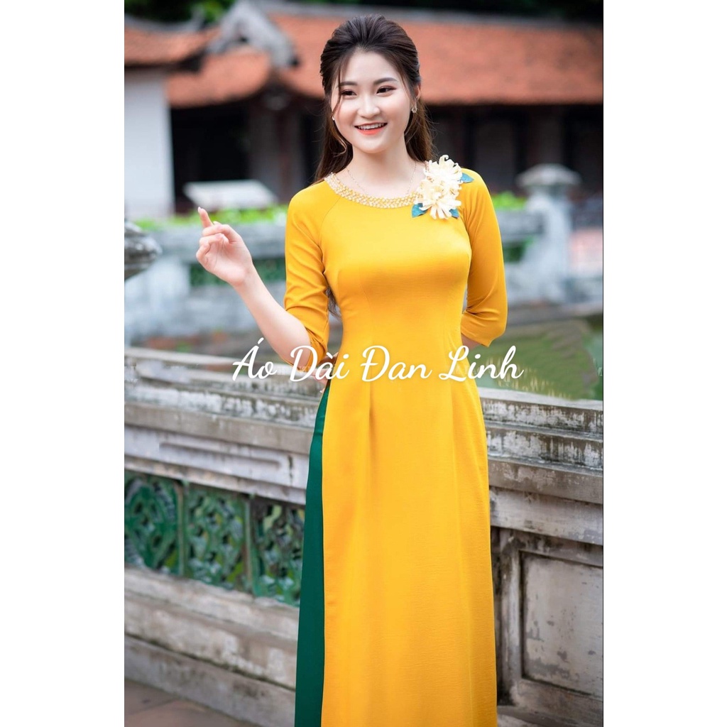 Áo dài vàng kết hoa đính ngọc trẻ trung - Áo Dài Đan Linh