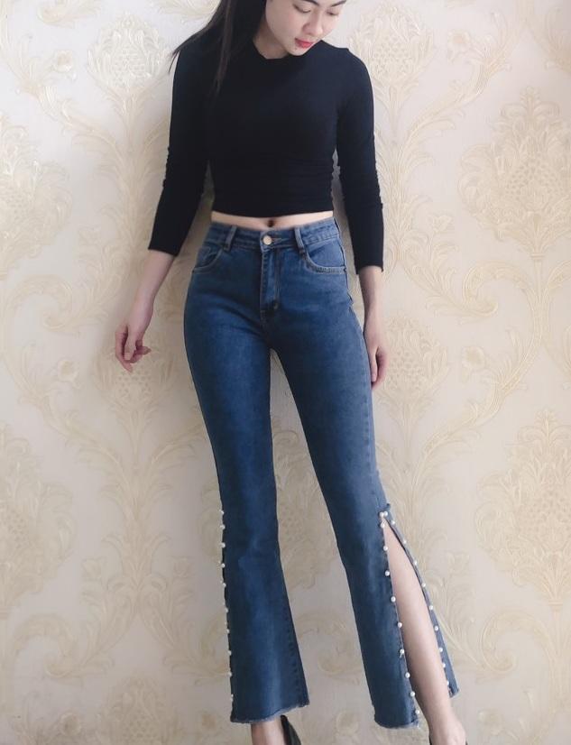 Quần jeans nữ ống loe dài xẻ gấu