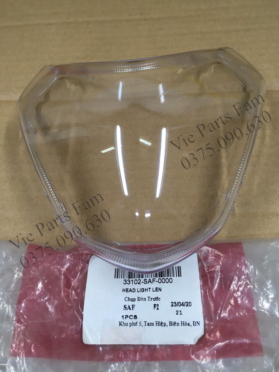 Mica/ mặt kính đèn pha xe elegant sym