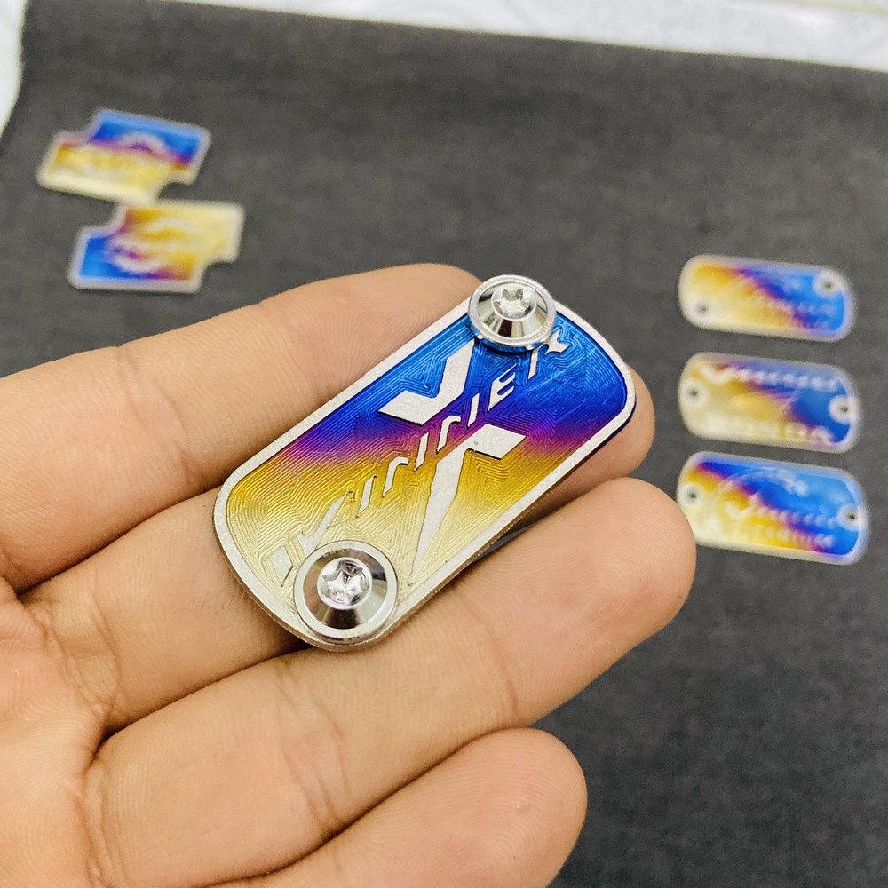 COMBO tem Titan gắp nắp bình dầu thắng dĩa trước xe WINNER X và 2 ốc GR5 5ly gắn nắp bình dầu (ốc Inox)