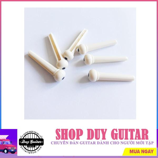 Chốt dây đàn guitar acoustic - chốt nhựa màu trắng - Shop Duy Guitar