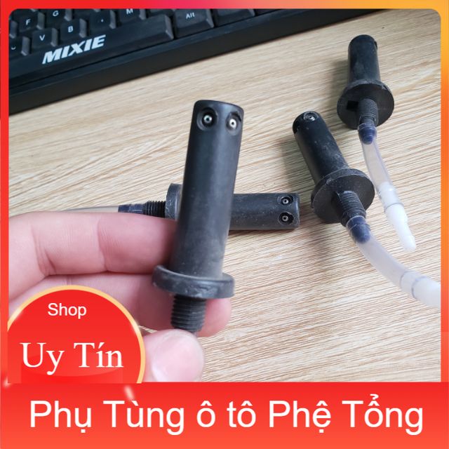 Phun nước rửa kính suzuki 5 tạ và 7 chỗ