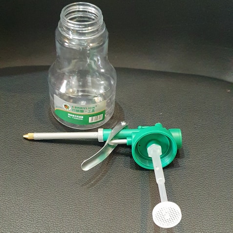 Bình Châm Nhớt Nhựa Trong Dung Tích Chứa 250ml Thiết Kế Tay Cầm Bằng Nhựa Cần Bấm Và Trục Bằng Kim Loai Bền Bỉ.