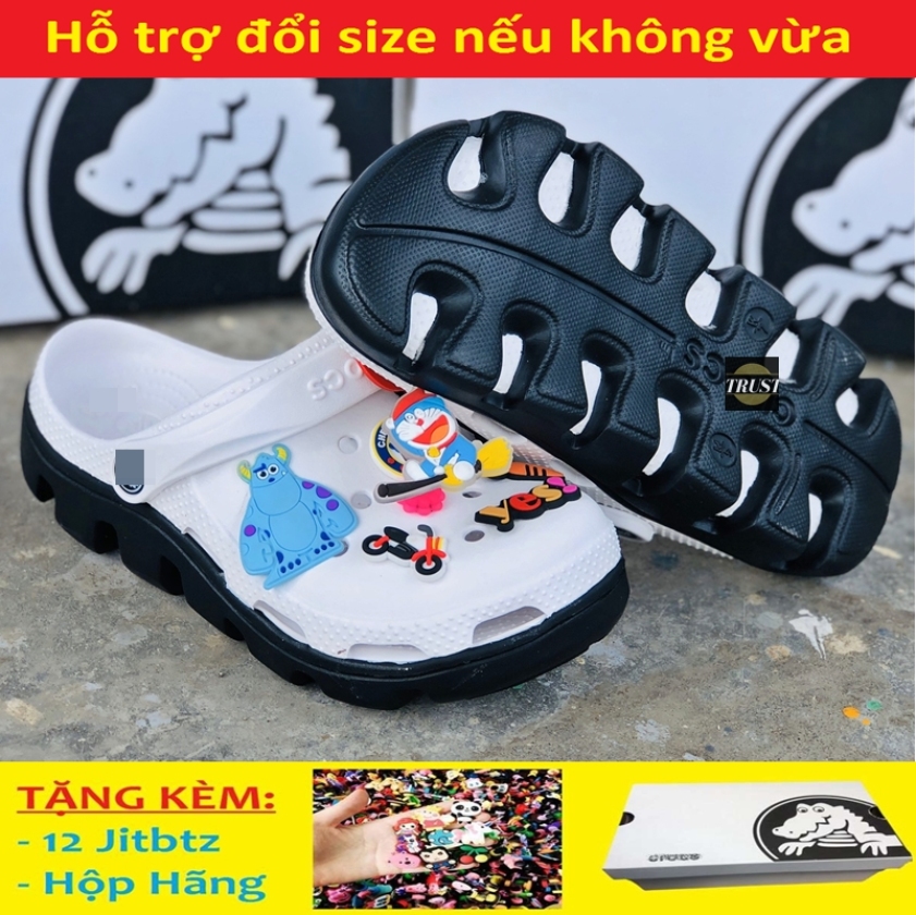 Dép sục Crocs duet quai ngang nam và nữ màu trắng đế đen, cá tính siêu nhẹ đi mưa đi nắng thoải mái chống trơn trượt, có nhiều lỗ thoát hơi thông thoáng, tặng kèm 12 jitbitz và hộp hãng - có hình thật và video tự quay giá rẻ