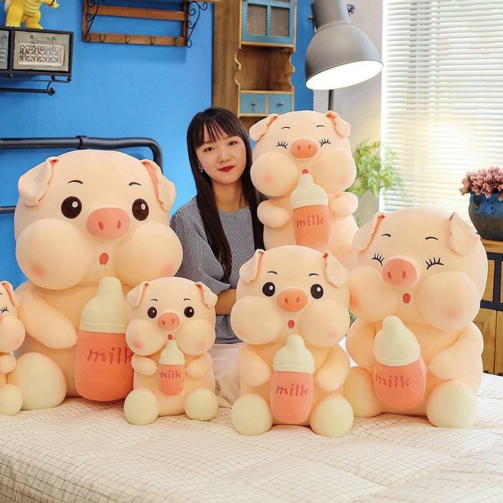 Gấu Bông Heo bông  ôm bình sữa