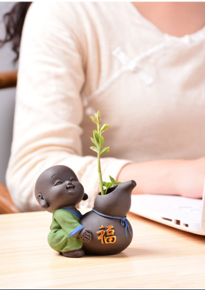 Tượng Chú Tiểu Và Chậu Gốm Cầu Phúc