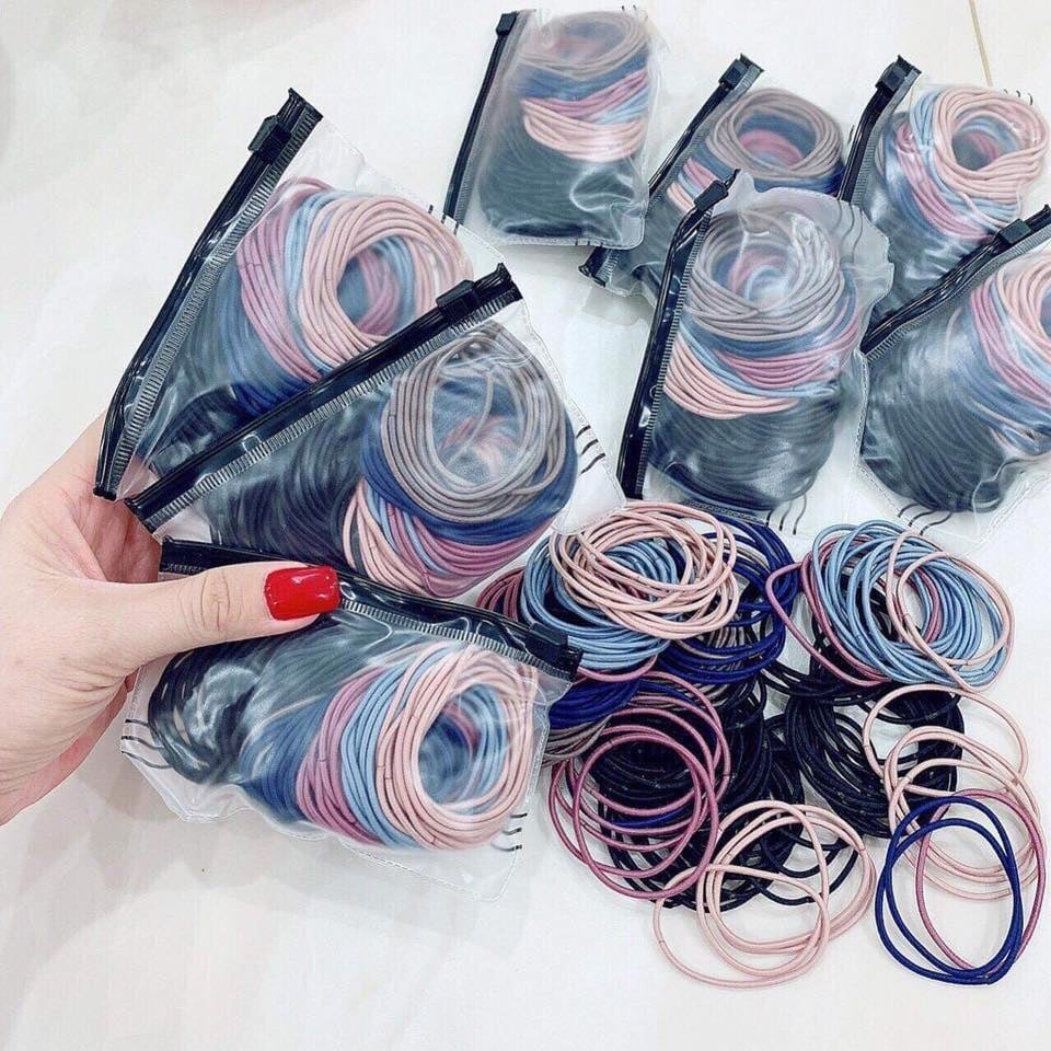 Set 100 thun cột tóc Quảng Châu kèm túi Zip