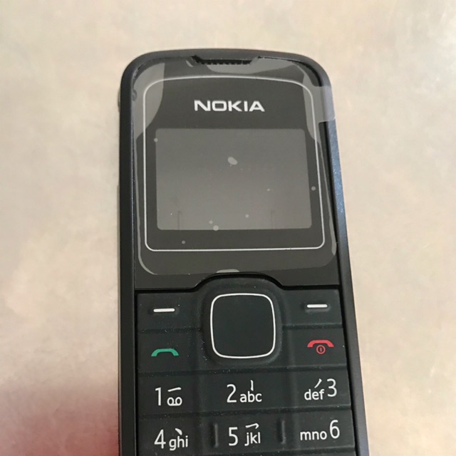 Combo:Bộ vỏ ,phím xịn : Nokia 1202 (phím xài không trầy )