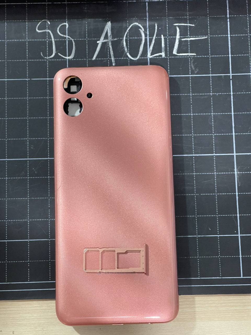 Bộ vỏ thay thế sam sung A04E kèm khay sim và kính camera