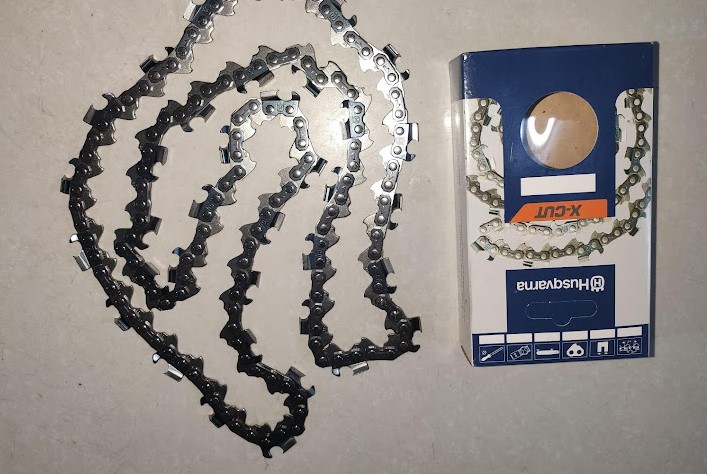 Xích cưa xăng lam 18 inch có 31 mắt cắt gỗ Husqvarna, bước 3/8", chân 1.5mm. hàng chuẩn hãng Hu, có logo dập trên xích.