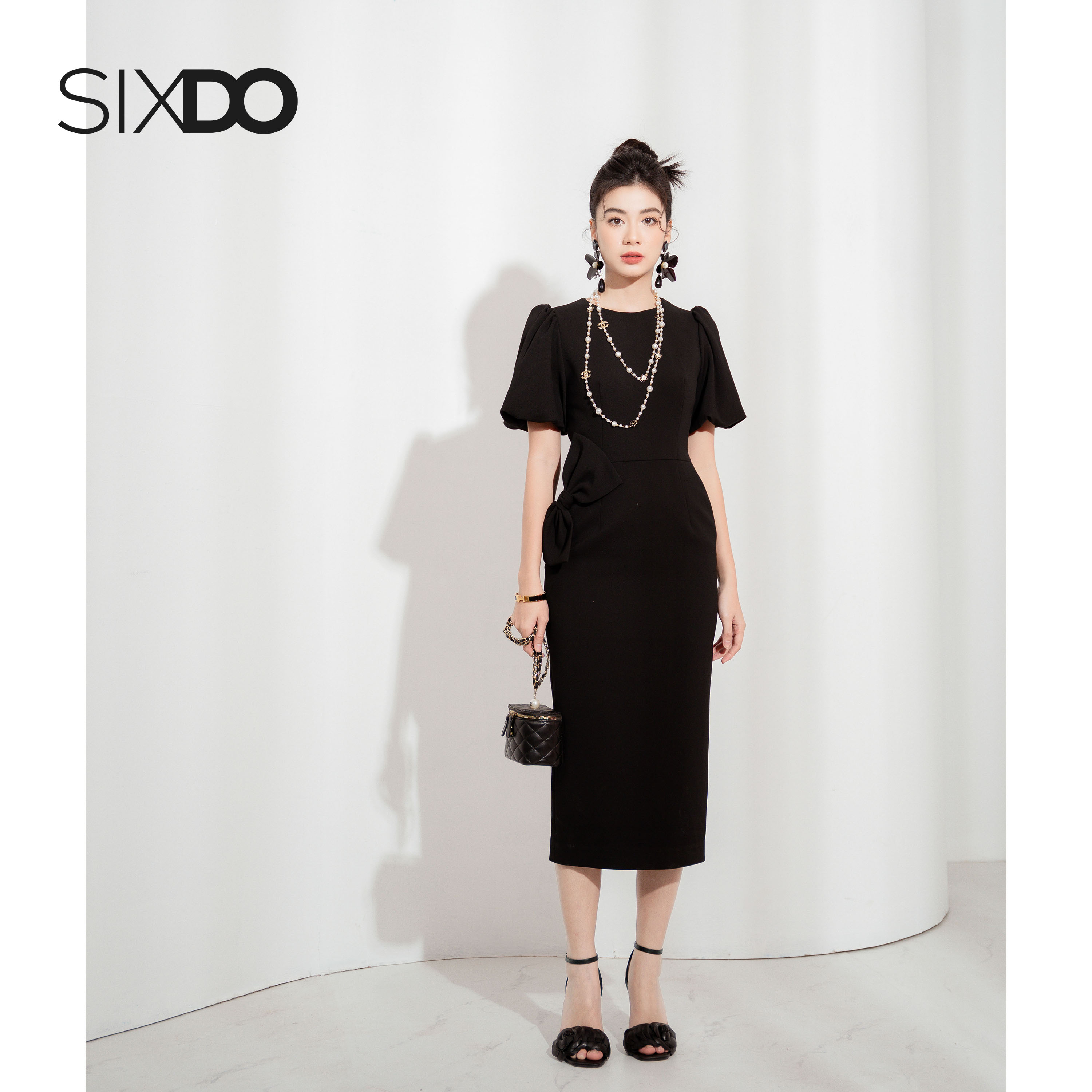 Đầm đen tay phồng phối nơ eo SIXDO