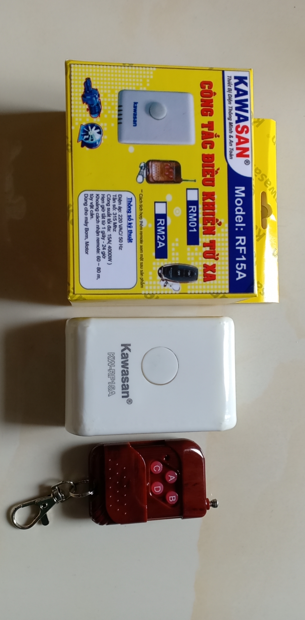 Công tắc điều khiển từ xa, công suất tải 750w, khoảng cách 100-300m (tùy môi trường sóng), 220V, Kawasan RF15A-RM01B