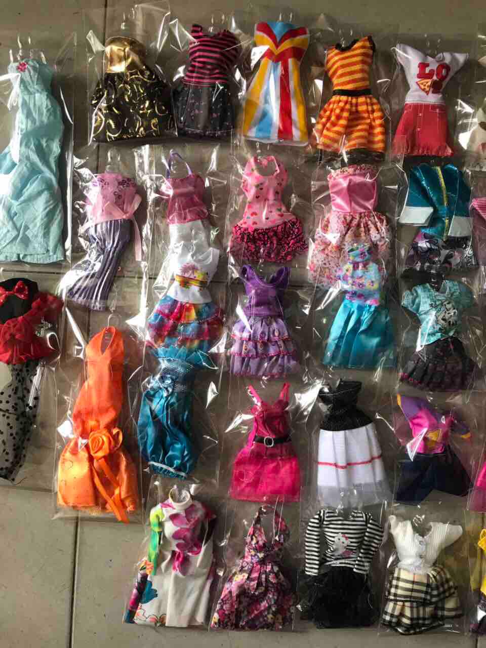 Quần áo búp bê - 50 bộ khác kiểu