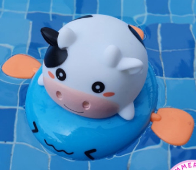 Đồ chơi NHÀ TẮM BÒ PHUN NƯỚC VẶN CÓN cho bé.