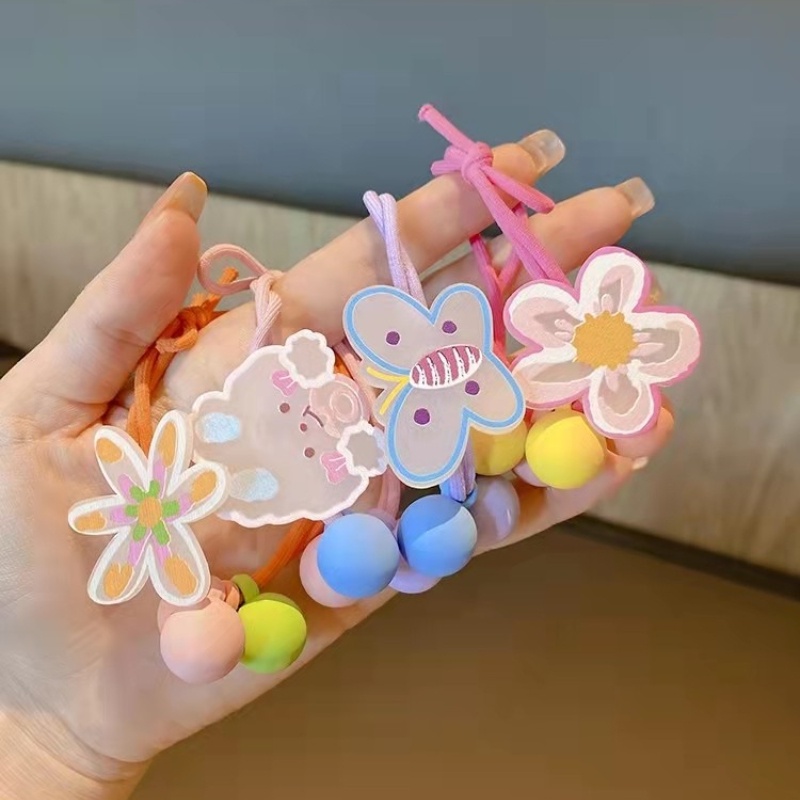 Dây cột tóc , chun cột tóc họa tiết đáng yêu