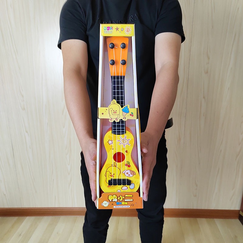 Đồ chơi đàn ghi ta Đàn Ukulele sai to cho bé